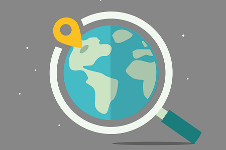 Weltkugel und Lupe Weltkugel mit Markierungspunkt und einer Lupe