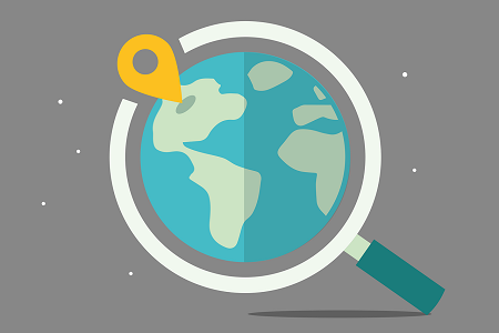 Weltkugel und Lupe Weltkugel mit Markierungspunkt und einer Lupe